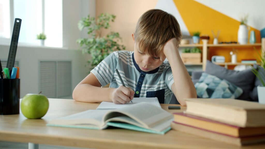 child studying for KS2 SATs