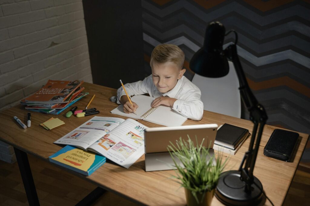 child studying homework