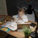 child studying homework