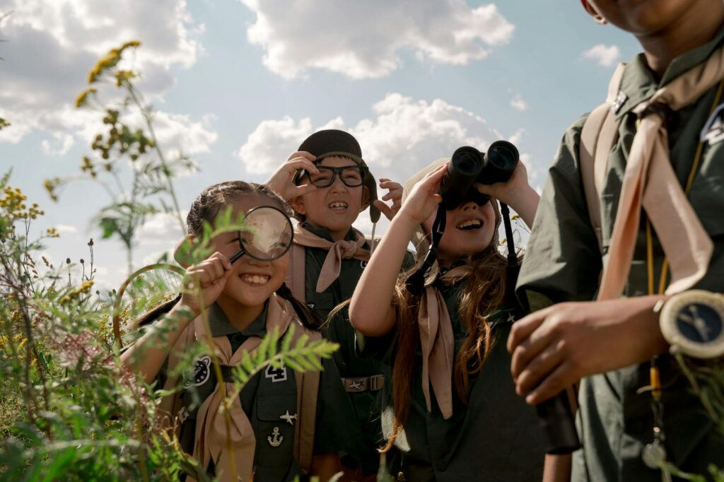 children exploring nature spring