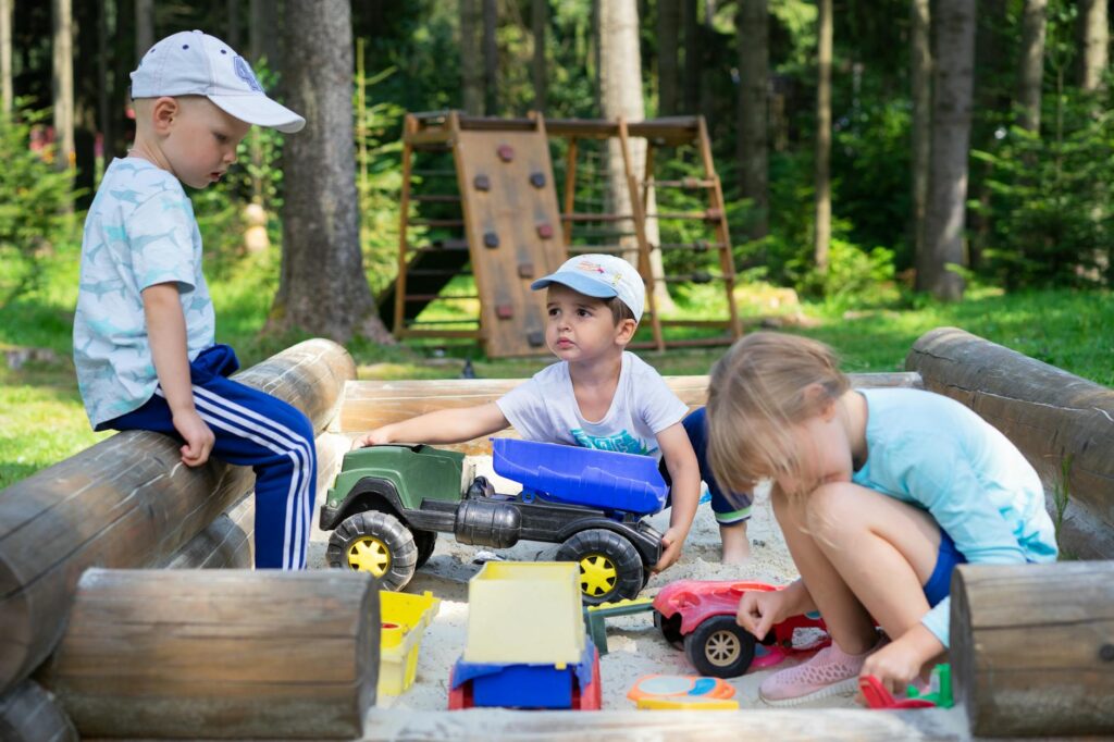 children playing with educational resources