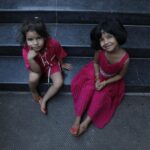 happy kids playing educational game UK classroom