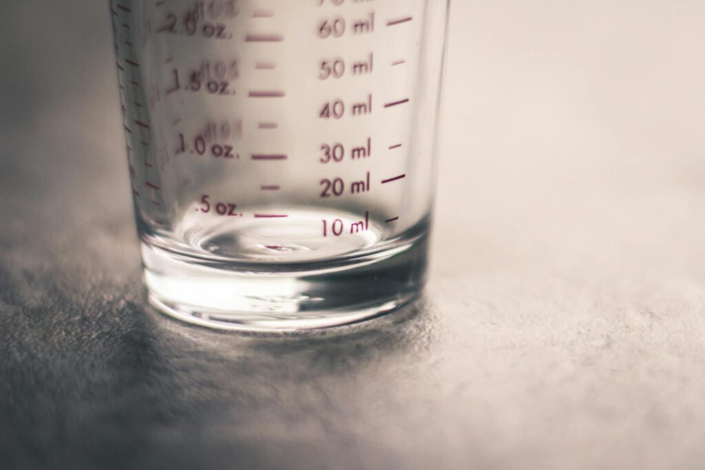 measuring cups and liter bottle