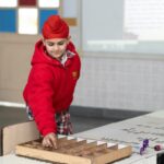 student playing educational game