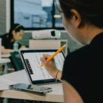 student using chromebook in classroom