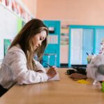 teacher organizing free classroom resources