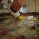 artist refining digital artwork