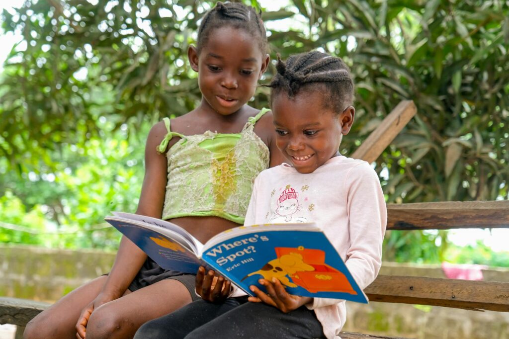 children reading scholastic news