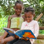 children reading scholastic news