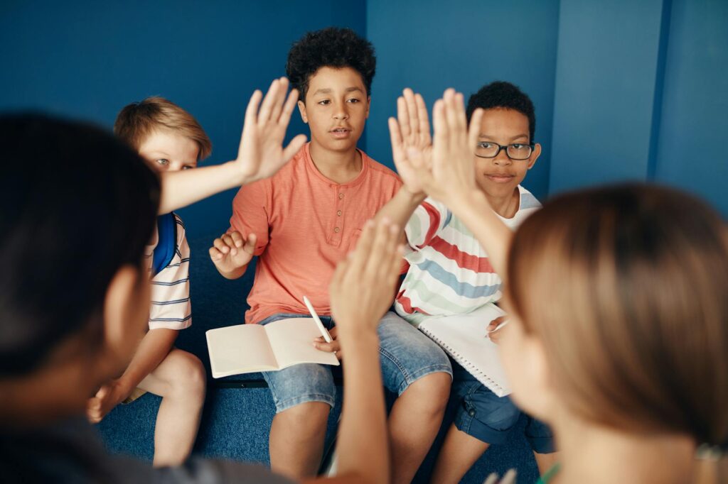 diverse students participating in classroom event