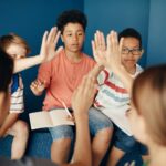 diverse students participating in classroom event