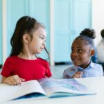 kids learning geography globe map