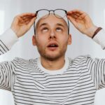 person looking at world map