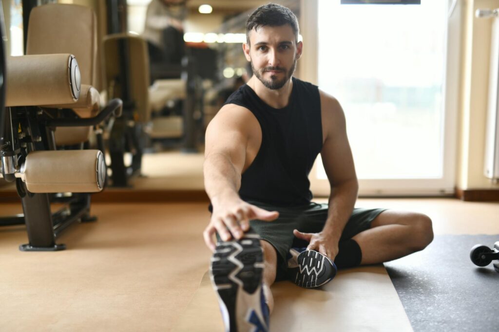person stretching outdoors