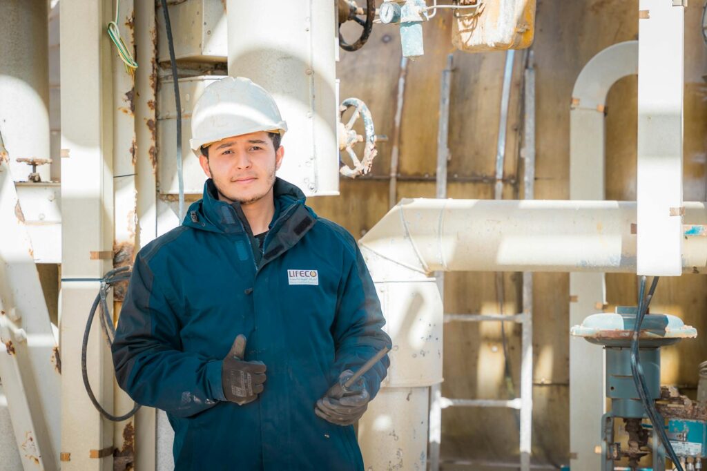 probationary engineer working on blueprint