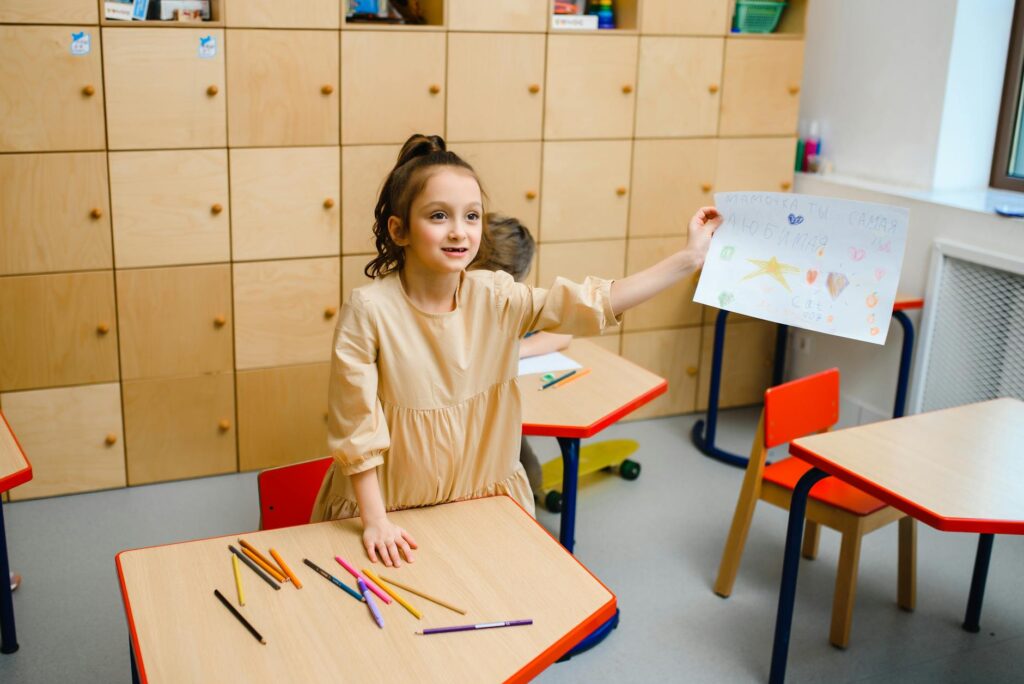 children drawing in classroom