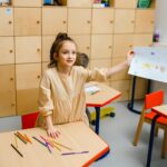 children drawing in classroom