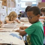 children drawing in classroom