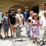 children interacting with classroom pets
