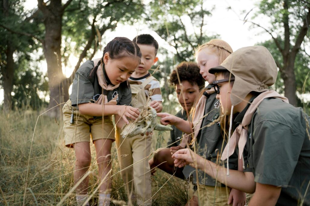 children learning in forest