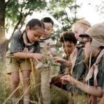 children learning in forest
