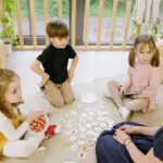 children playing educational game in classroom