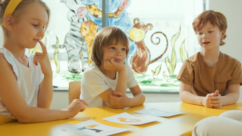 children playing educational game in classroom