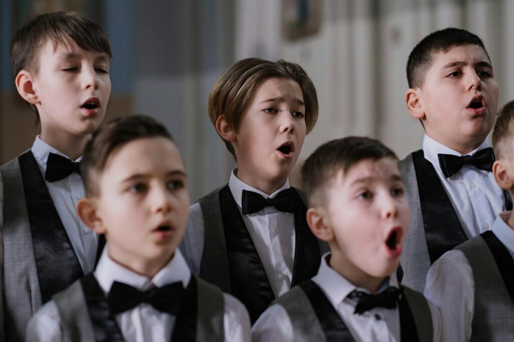 children singing christmas carols classroom