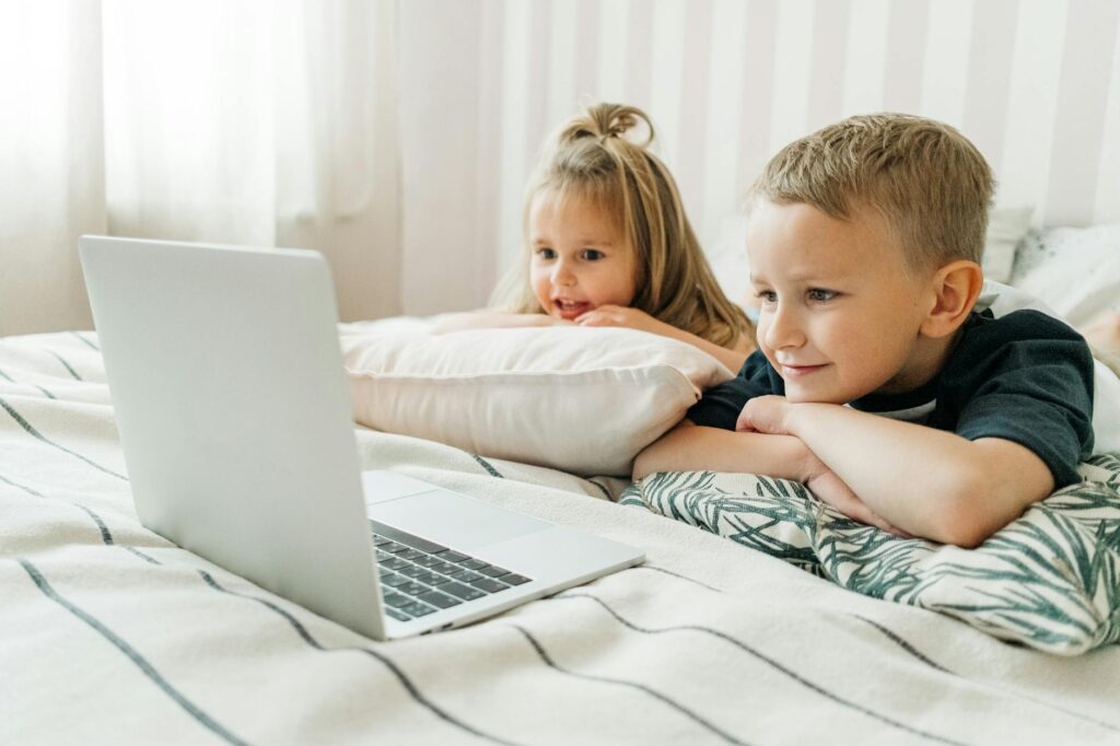 children watching educational video in classroom