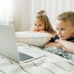 children watching educational video in classroom