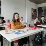 students in a modern classroom using technology