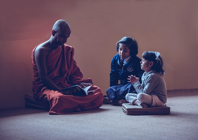 Teacher reinforcing positive behaviour with a student